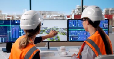 Water engineers reviewing digital treatment plant data