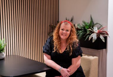 Lissa Wood, Director of SME Customers at Wave, seated in the company’s office