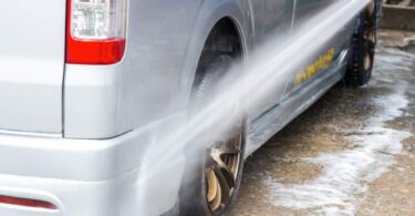 Vehicle being washed with water during South West Water drought restrictions