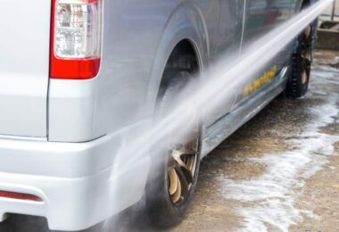 Vehicle being washed with water during South West Water drought restrictions