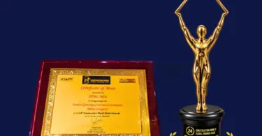 Gold-toned Construction World Global Awards 2026 trophy with diamond-topped figure beside a framed Certificate of Merit for S