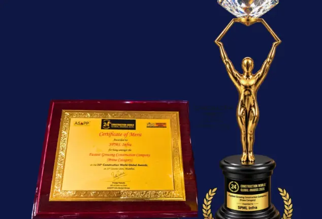 Gold-toned Construction World Global Awards 2026 trophy with diamond-topped figure beside a framed Certificate of Merit for S